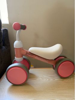 pink toddler walking bike