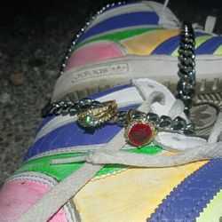 STERLING SILVER NECKLACE AND GOLD PLATED RINGS