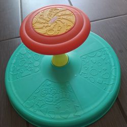 The Spin Toy brings excitement with its vibrant red, yellow, and green design. Ideal for active play, it promotes movement and coordination. A must-ha