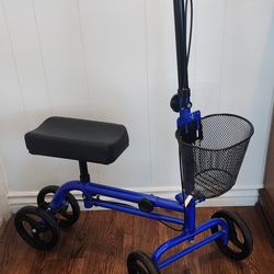 KNEE SCOOTER/WALKER.   BLUE FRAME, DUAL BRAKES, WIRE BASKET, WIDER FRONT/LARGER TIRES. EXCELLENT CONDITION!