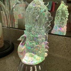 PEACOCK - Battery operated sparkle, changing color, plastic peacock (batteries included) 11”T (base is a little faded)
