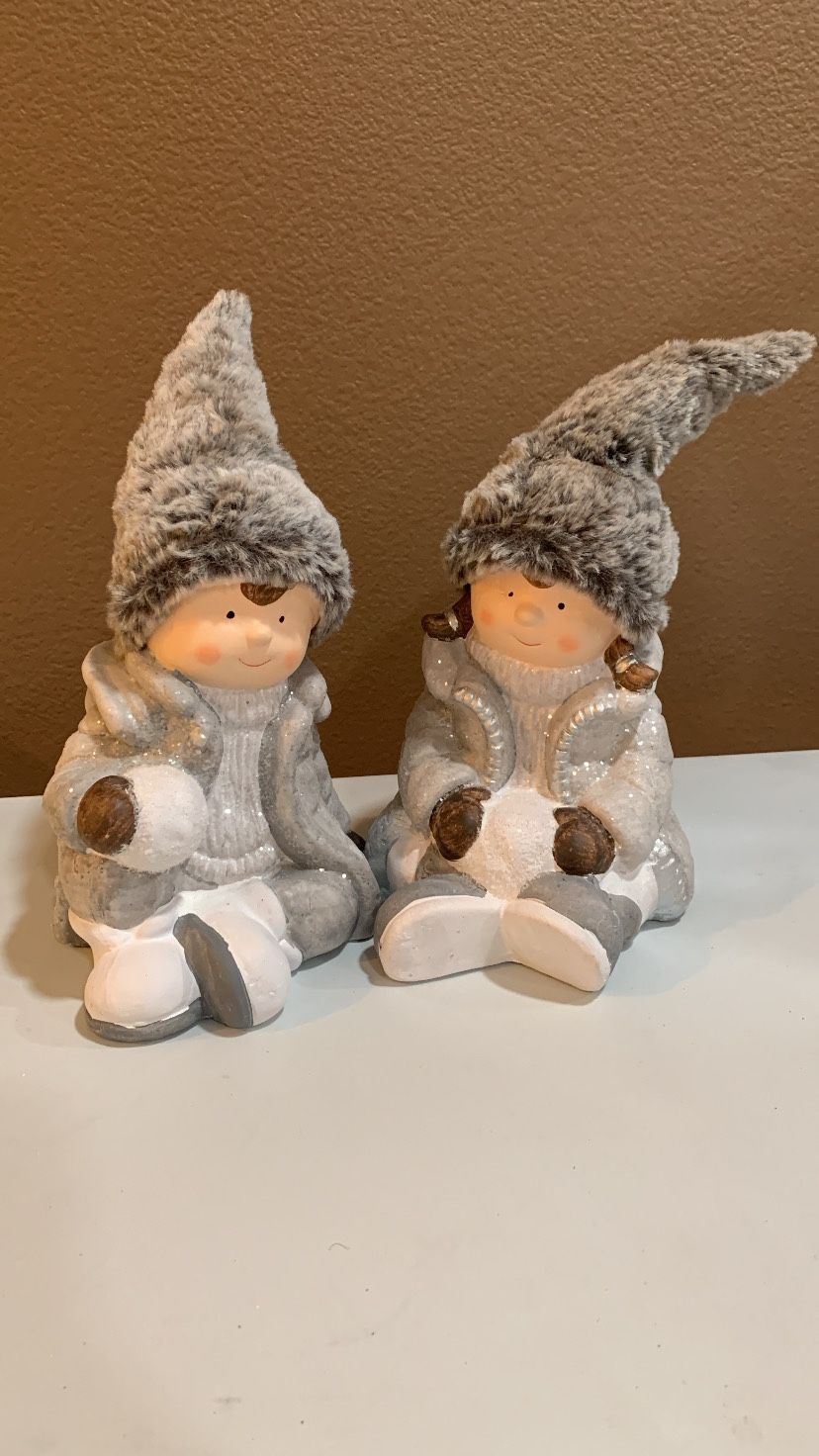 Christmas boy and girl figurines