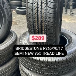 SET OF TIRES 265/70R17 BRIDGESTONE 95% TREAD LIFE LEFT