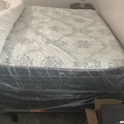 Brand new queen, size mattress, and box springs