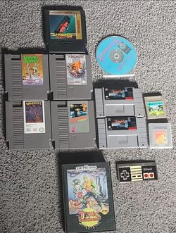 Retro Games Mix Lot of 11 games and a Nintendo belt buckle