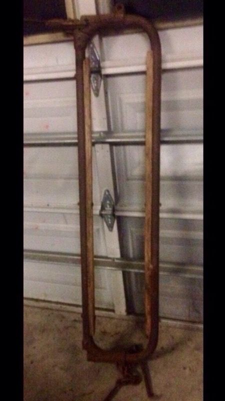 Antique Dairy Stanchion. Old west cow stanchion. Made of iron and oak. This is a James Stanchion! One antique rustic cow / cattle / dairy stanchion.