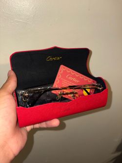Cartier black & gold rimless glasses