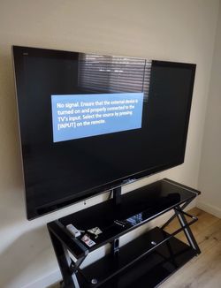 Panasonic 65" Plasma HDTV TC-P65GT30 1080p 3D Smart TV, With Table Under It