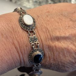 Vintage sterling bracelet with panels of onyx and mother of pearl 