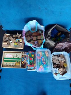 $50 firm, Yes, it's available, kids educational toys. Wood blocks, bricks, train set, gears and cogs, letters,  geometry shapes. $200 retail value