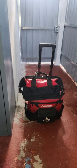 Maleta con ruedas y bolso husky los dos usado pero buenas condiciones