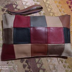*CARLOS SANTANA* LEATHER PATCHWORK CLUTCH. ONE LARGE INTERIOR ZIPPERED POCKET. (*MEASUREMENTS BELOW: CLUTCH NO LONGER AVAILABLE, ONLY HERE!/*(C-59931)