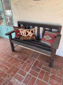 Vintage Wooden Bench with Western Pillows