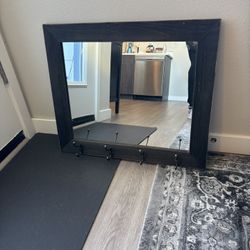 Framed Mirror With Coat Hangers
