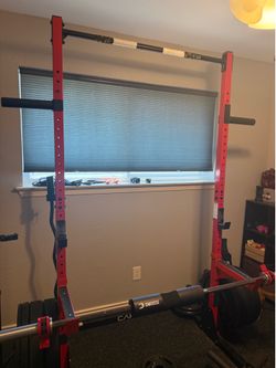 Power rack + safety catches + plate holders