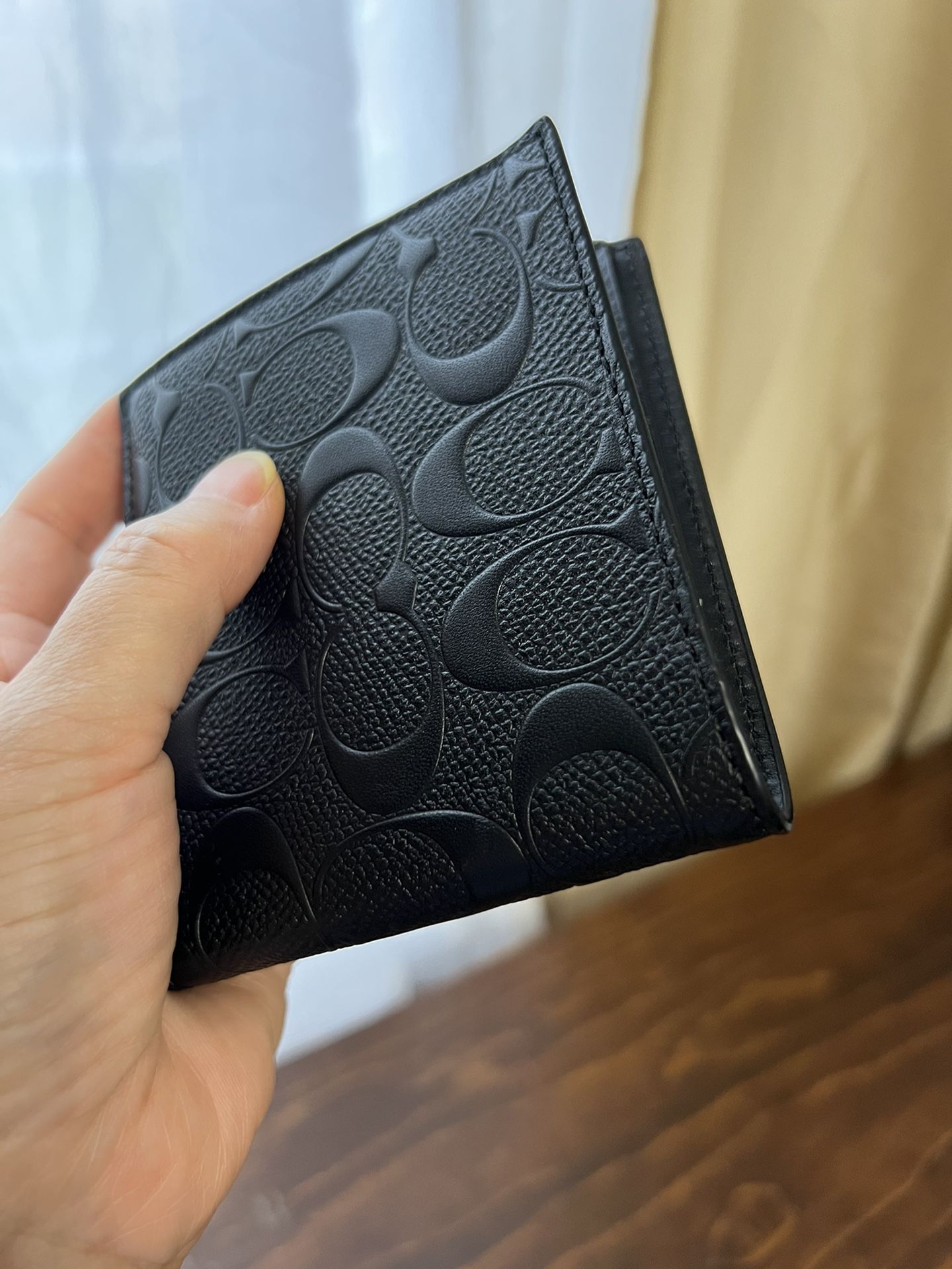 Coach Men's Embossed logo leather Wallet for Sale in Queens, NY