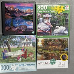 Lot Of 4 300piece Puzzles 