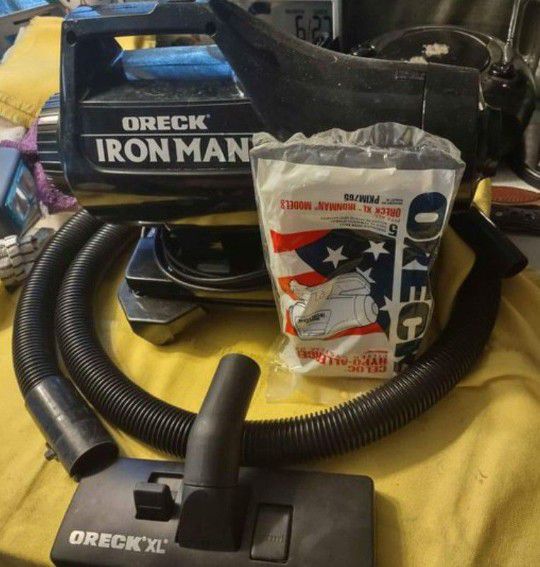 Oreck Iron Man Vacuum Cleaner With Brand New Bags