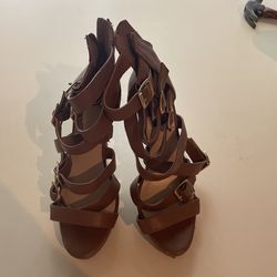 Brown high-heeled shoes