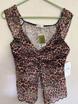 Woman cheetah print top