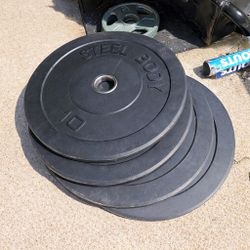 Four 10lb Olympic Bumper Plates 