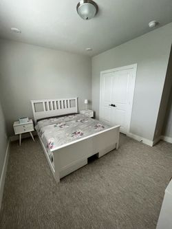 Ikea queen size bed with storage + 2 night stands