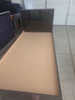 Twin bed with working drawers