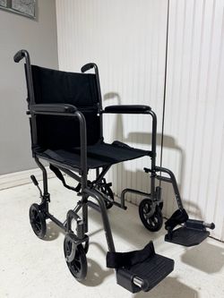 Transport wheelchair, silla de transporte