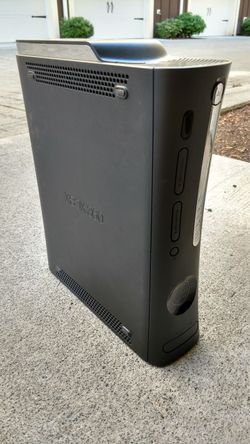Black Xbox 360 Elite with cords and controller