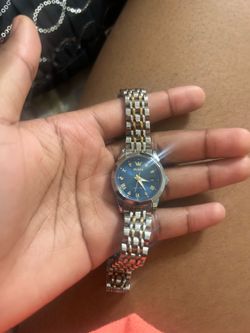 two-tone silver and gold OLEVS quartz watch