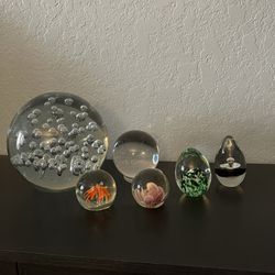 5 Glass Paperweights And 1 Glass Glow