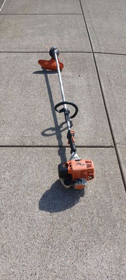 STIHL FS 90 R is a powerful 27.2 cc gas-powered straight-shaft string trimmer and brushcutter