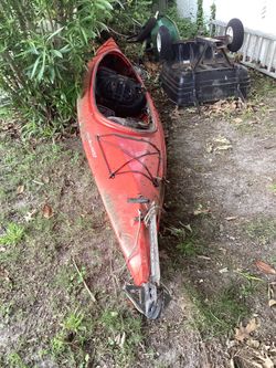 Red/orange kayak.