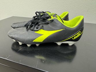 Soccer cleats and shin guards Nike Diadora