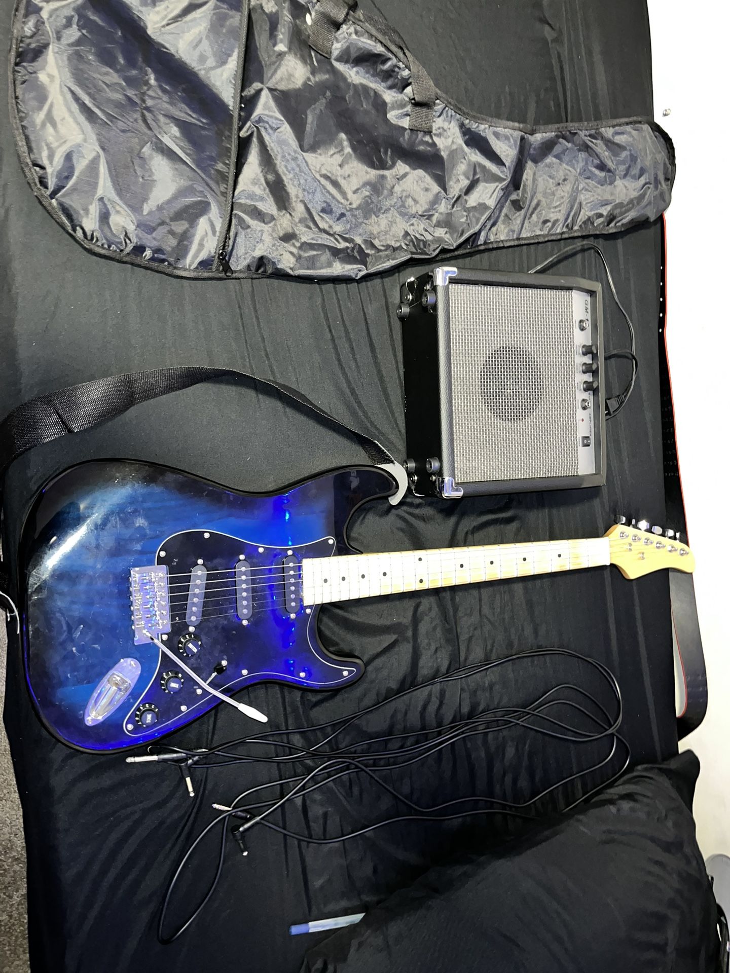 Strat Electric Guitar With Amp And Amp Cords 