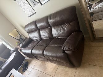Brown Leather Reclining Sofa’s and tables