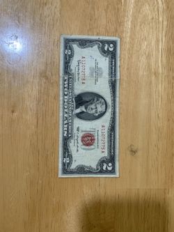 ERROR TWO DOLLAR BILL (RED)