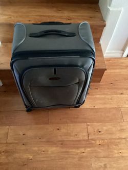 Samsonite  Luggage./ Suitcase(.Grey) Dimensions are;  17”W— 10”D — 26”H.