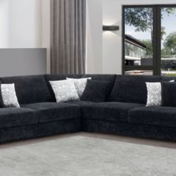 BLACK SHERPA SECTIONAL WOTH THROW PILLOWS 