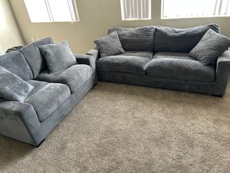 Grey sofa and loveseat