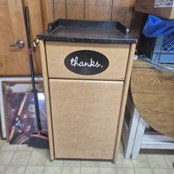 Garbage Bin With Swinging Lid