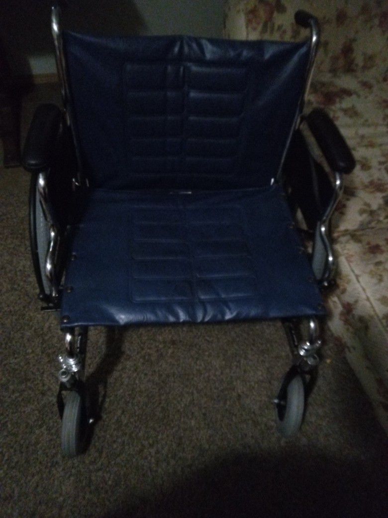 Deluxe Invacare Wheel Chair 