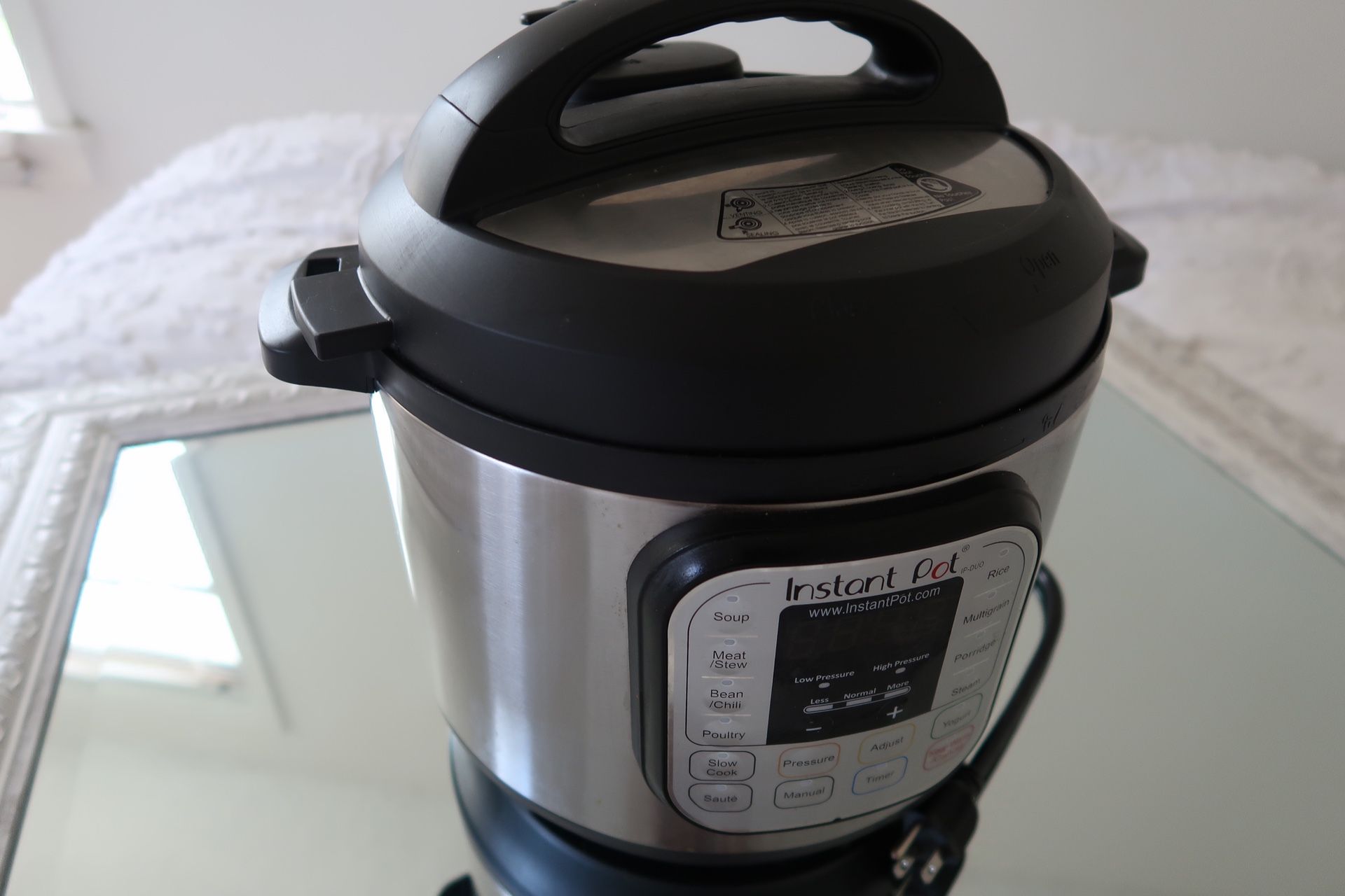 Instant Pot Duo in Electric Pressure Cooker, Sterilizer, Slow