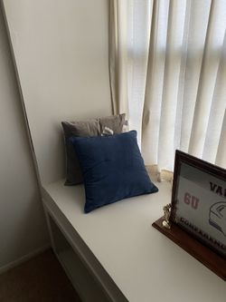 Sectional with pillows and barstools kept in non smoking pet free environment