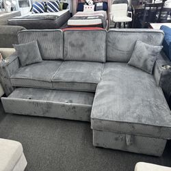 New Dark Gray Reversible Sectional W/ Cup Holder