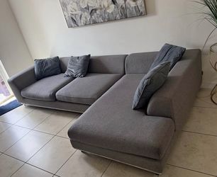 Sectional Grey Fabric . Price Including Delivery