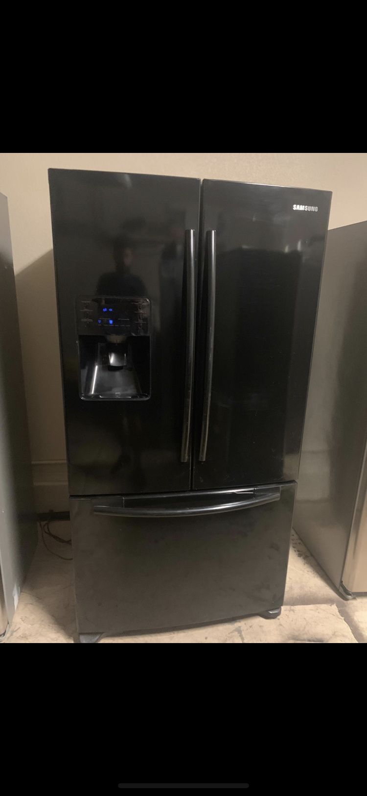 Black Samsung French door fridge Double ice machine one month warranty. FREE DELIVERY