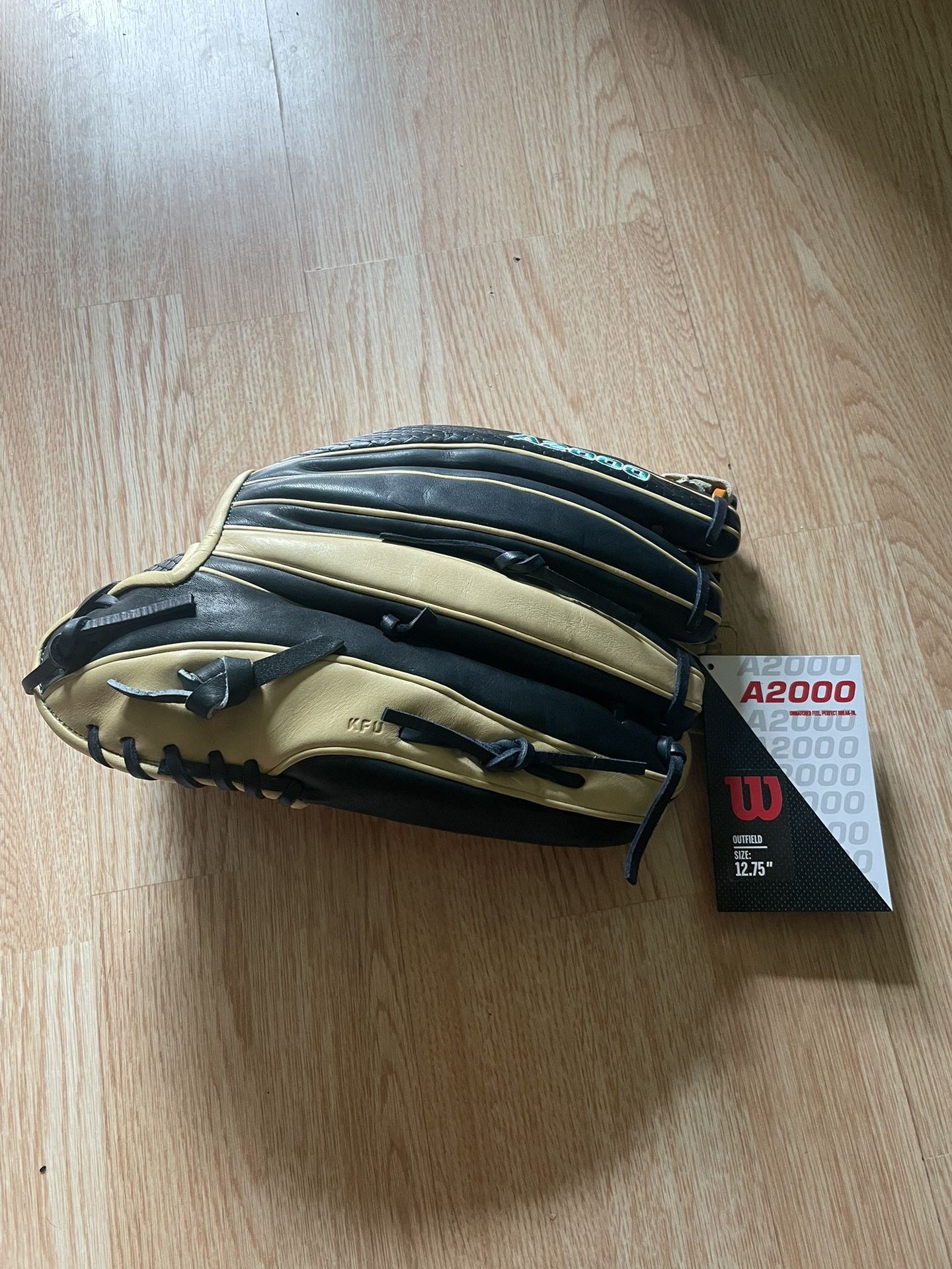 Lefty Black and cream Wilson A2000 baseball glove