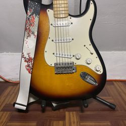 Used 2000 Fender Standard Stratocaster w/bag and stand ect. Good starter.