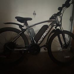 Outback Mountain Bike, Comes With Battery On It, Very Good Condition, Top Speed Of 22 Mph